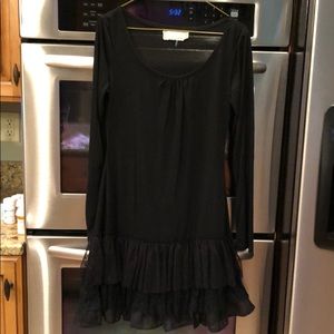 Women’s ruffle dress/tunic (vest sold separate).